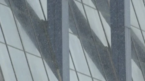 Background. Winter. Very fine snow on a background of mirrored Windows. Video stock 66879005