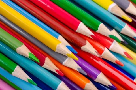 Background wooden colored pencils. Stock Photos