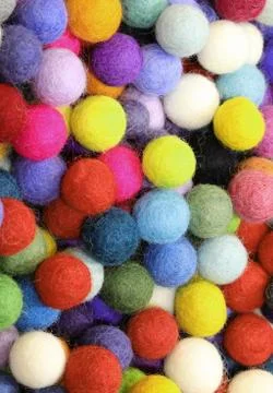 Background of wool balls or felt balls.These are the typical christmas orname Фото