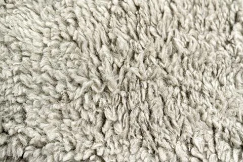 Background from woolen cloth in a solid gray color, blank for design Stock Photos