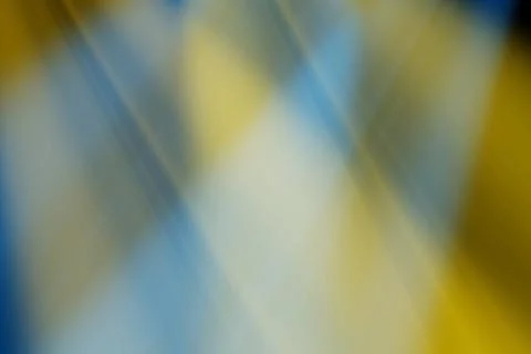 Background of yellow blue rays of light Stock Illustration