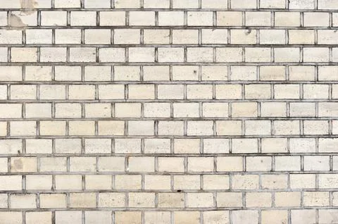 Background of yellow brick wall Stock Photos