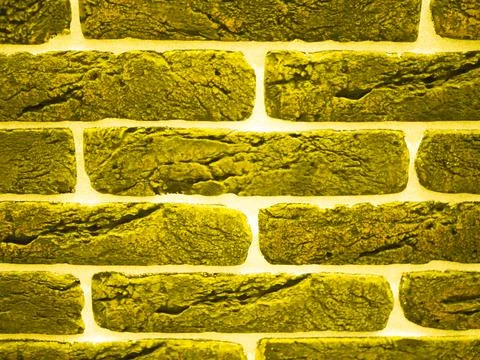 Background from a yellow brick wall. presentation of fashion colors 2021 Stock Photos