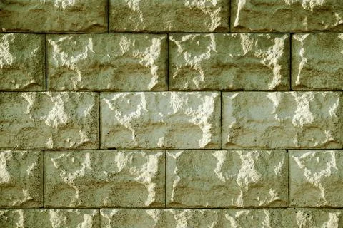Background of yellow bricks. Wall of yellow bricks. The texture of the wall Stock Photos