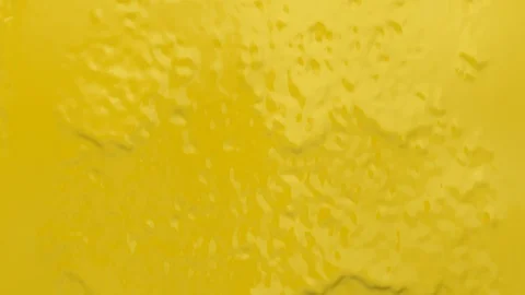 Background of yellow paint flowing down wall / screen (Full HD) 動画素材 110819090