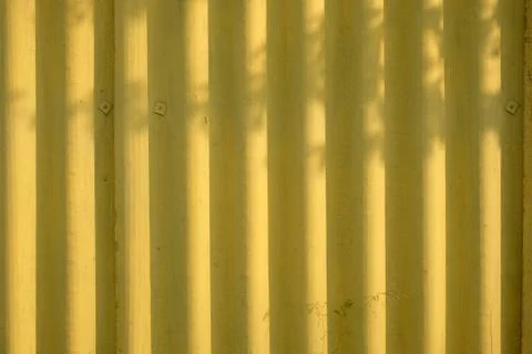 Background of yellow painted of iron sheet Stock Photos