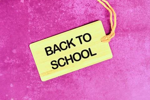 For backgrounds and presentations. The words Back to School on a card with a  Stock Photos