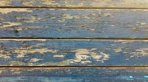 Backgrounds and texture concept - old wooden fence painted in blue background Stock Photos