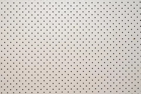 Backgrounds and textures from leather in white with a perforation Stock Photos