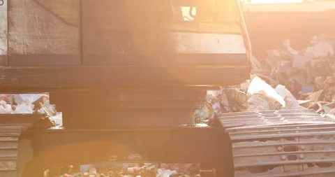 Backhoe and bulk garbage, backhoe in place to recycle waste, Stock Footage 118215876