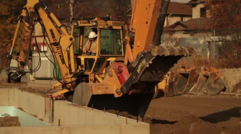 Backhoe and excavator working Video stock 21563125