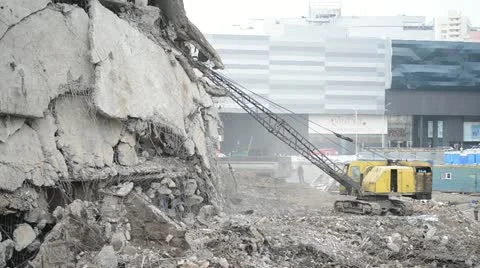 Backhoe car destroyed old building . Stock Footage 22007615