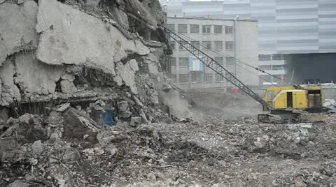 Backhoe car destroyed old building . Stock Footage 22007669