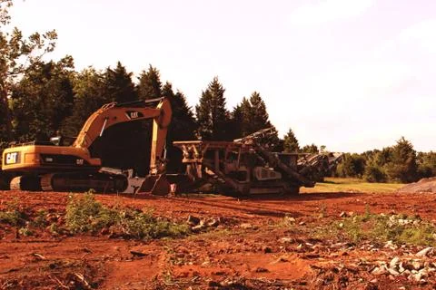 Backhoe on construction site in the field 库存照片