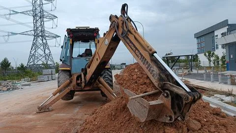 Backhoe at the construction site, Stock Photos