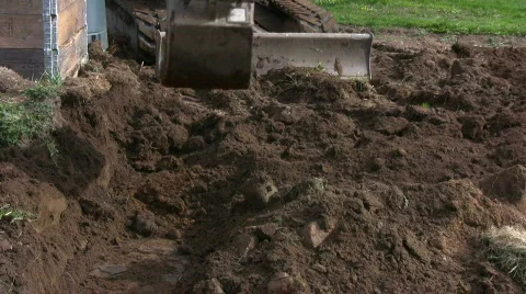 Backhoe dig in a garden Video stock 733247