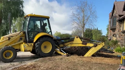 Backhoe digging Septic Stock Footage 174847007