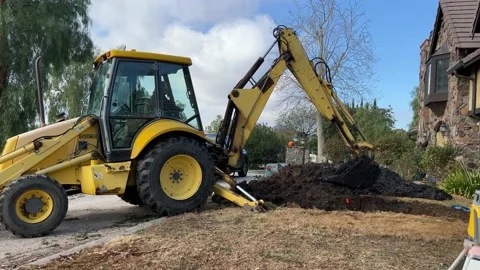 Backhoe Digging Septic2  Stock Footage 174851596
