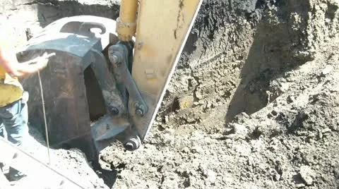 Backhoe Digs Cautiously After Ground is Probed Video stock 12571048