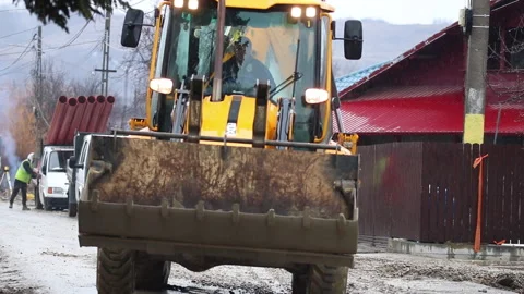 Backhoe excavator at a construction site Stock Footage 339630413