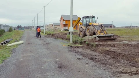 Backhoe loader digging soil. Construction site Video stock 73042906