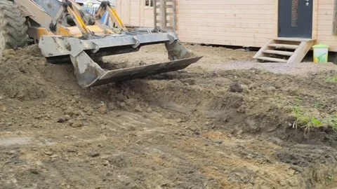 Backhoe loader makes the work at the construction site. Stock Footage 73042753