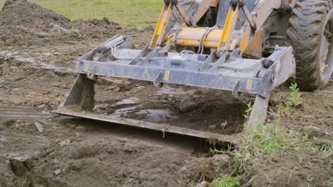 Backhoe loader makes the work at the construction site. Video stock 73042955