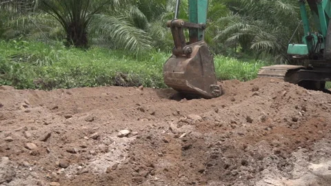 Backhoe loader soil dig working at construction street site outdoor Stock Footage 167784760