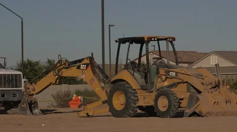 Backhoe parked at construction site 02 Stock Footage 45515779