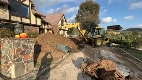 Backhoe Reverse shot Wide Stock Footage 174851838