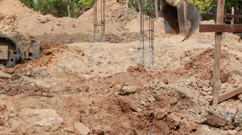 A backhoe tractor works on a construction site Stock Footage 33833621