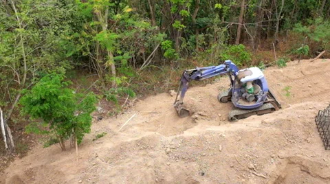Backhoe tractor works in construction site Video stock 38520369