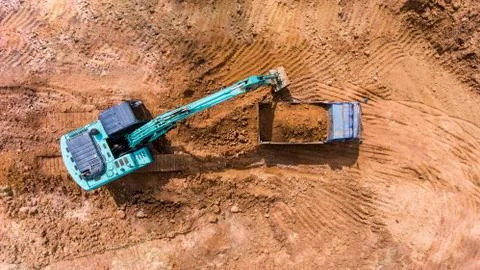 Backhoe working construction site Stock Photos