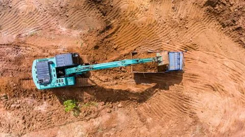 Backhoe working construction site Stock Photos