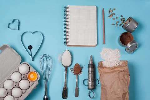 Backing background with ingredients for baking and kitchen tools. Stock Photos