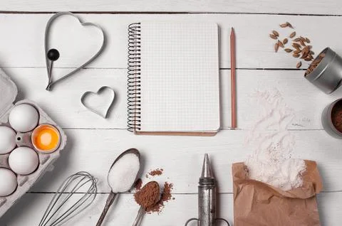 Backing background with ingredients for baking and kitchen tools. Stock Photos