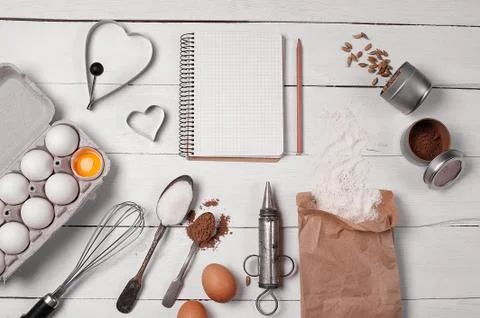 Backing background with ingredients for baking and kitchen tools. Stock Photos