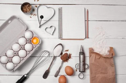 Backing background with ingredients for baking and kitchen tools. Stock Photos
