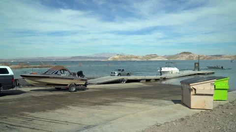 Backing boat on trailer down a boat laun... | Stock Video | Pond5