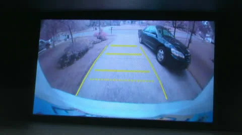 Backing out of driveway using back-up camera Stock Footage 24817796