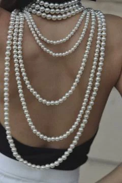 Backless Grace with Pearl Layers in Full Color Stock Photos