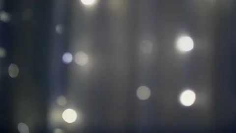 Backlight, flashing lights, bokeh effect. Abstract background. Stock Footage 191769571