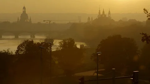 Backlight setting to Dresden skyline , mosquitoes dancing in the foreground Видео 72752978