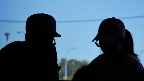 A backlight shot of people. Stock Footage 201055617