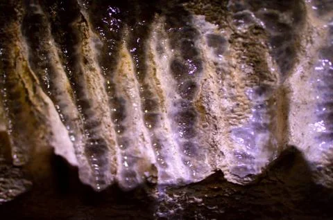 Backlight stalactites in the cave Stock Photos