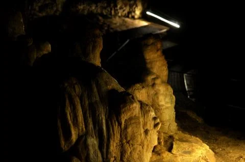 Backlight stalactites in the cave Stock Photos