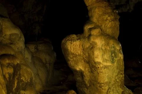 Backlight stalactites in the cave Stock Photos