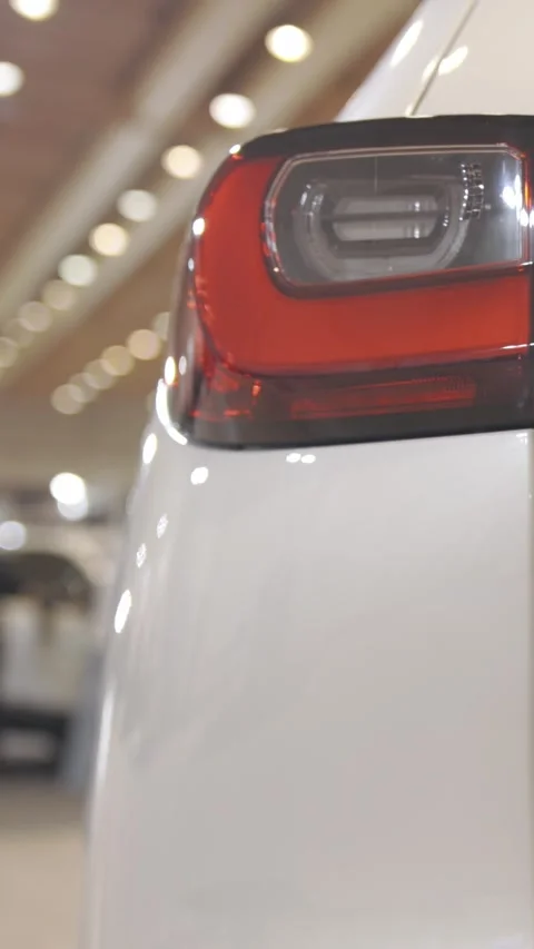 The backlight of a white electric car Stock Footage 328452415