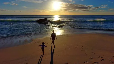 Backligth sunset on beach Stock Photos
