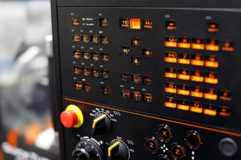 Backlit buttons on the CNC control panel Stock Photos